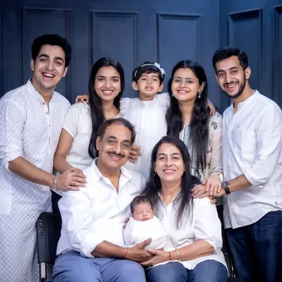 This is what it's all about. Three generations, all together, celebrating the arrival of a new family member. I love capturing these big, happy, multi-generational portraits that I know will be cherished forever.