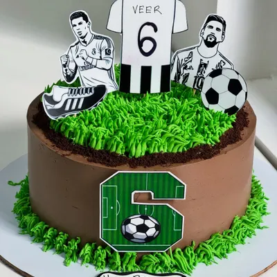 For the little champion who lives and breathes football. This cake features green turf piping, a custom jersey topper, and iconic players to turn a passion into a delicious moment.