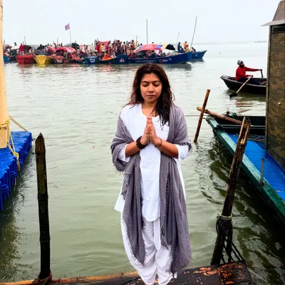 A moment of prayer at the Mahakumbh, standing at the confluence of sacred rivers. The desire for liberation and the feeling of divine love is palpable in such a powerful place.