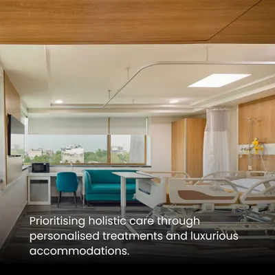 This patient suite prioritizes holistic care with luxurious accommodations and personalized touches. The design provides ample space for family, a view to the outside, and a warm, hospitality-driven aesthetic to ensure comfort during recovery.
