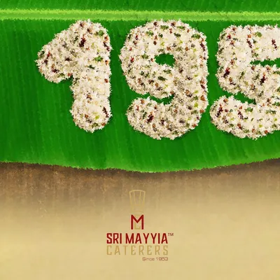 1953. The year it all began. This image, crafted from rice on a banana leaf, represents our deep roots in tradition and our long-standing history of service.