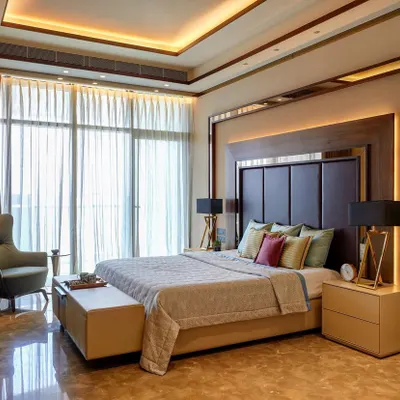For our 'Omkar' project, this bedroom was designed with immaculate detailing to promote clarity of mind. We used clean lines and intentionally soothing, layered lighting to create a serene sanctuary that is both minimalistic and lucid, providing a perfect start and end to each day.