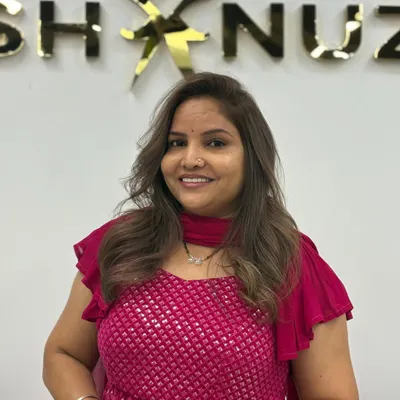 A beautiful, happy client showing off her new highlights and toned color. Her smile is the perfect accessory.
