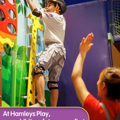 At Hamleys Play, your child's safety always comes first. A Play Pal spots a young climber, providing encouragement and ensuring all safety measures are in place. We are always there to support their adventures.