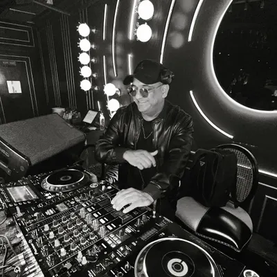 In the mix at Lord of the Drinks in Powai, one of my regular spots. This black and white shot captures the focused intensity of a live club set.