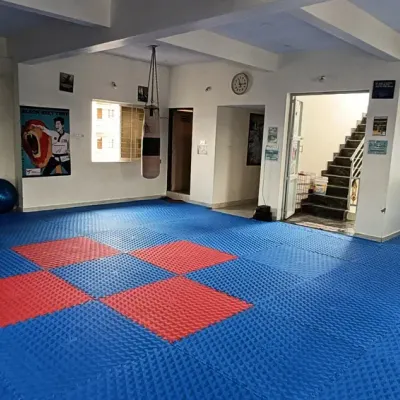 A view of our spacious and clean dojang, with matted floors ready for training.