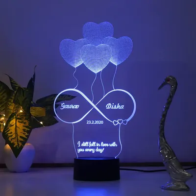 This 3D illusion lamp creates a stunning visual effect, customized with your names and a special date inside an infinity symbol. It's an incredibly romantic gift for a wedding or anniversary.