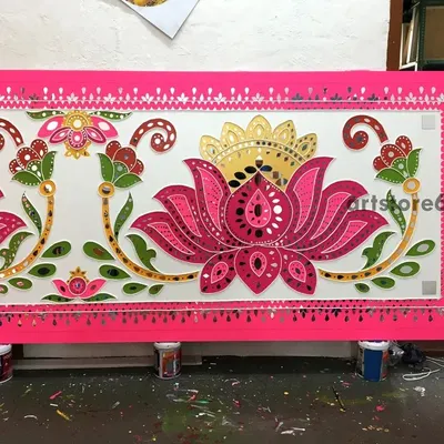 A finished Lippan wall panel featuring a repeating lotus design with a vibrant pink border. This piece is ready to be installed and shows how we can create modern, stylish decor using traditional Indian art forms.