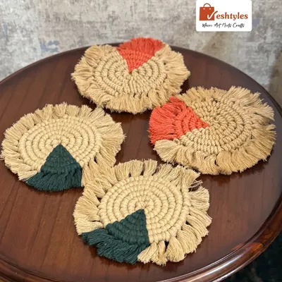 Add a pop of color to your coffee table with my handmade macrame coasters. This set shows how you can mix and match colors, here with earthy jute and vibrant orange and green. They are perfect for protecting your tables.