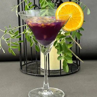 Our Butterfly Blue Pea Cocktail with Ice Apple and Mango Bits is a visual and flavorful delight. The natural color-changing properties of the flower make it a showstopper.