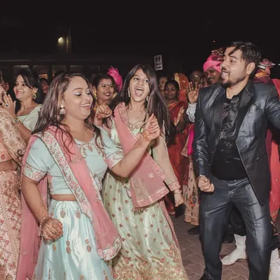 The dance floor is where the celebration comes alive! I love getting in the middle of the action to capture the energy and fun of the wedding party.