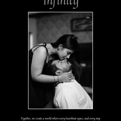 An intimate black and white photo of the bride kissing the groom's forehead, framed with the word "Infinity" to symbolize their endless love.