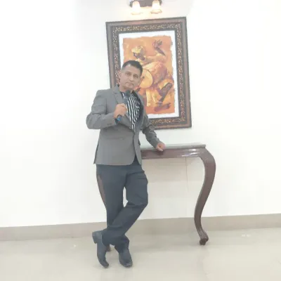 A classic pose, ready to host. Dressed in a sharp suit, I'm prepared to add a touch of class and energy to your formal or family function.