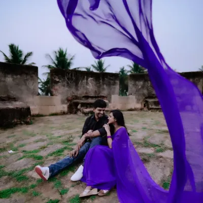 Lost in a purple haze. My signature flying saree adds a magical, flowing element to this romantic couple's shoot.