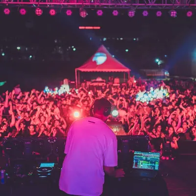 A view from my perspective, facing a massive, energetic crowd at the Sammscrithi '25 festival in Mysuru. This is what a large-scale music event is all about.
