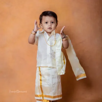 When tradition meets cuteness, you get magic like this. This little one looks so handsome in his traditional veshti.
