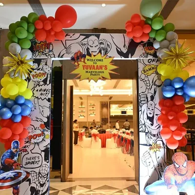 The grand entrance to Yuvaan's Marvel-ous party. I designed this comic-book style archway with colorful balloon garlands and cutouts of Captain America and Spider-Man to welcome guests into the action.