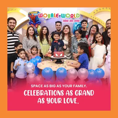 We have plenty of space for the whole family. This photo captures a large group celebrating a Spiderman-themed birthday, showing how we accommodate kids, parents, and grandparents together.
