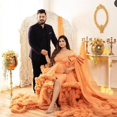 This peach gown with a large bow and a full ruffled train is the definition of glamour. It's perfect for a luxurious indoor photoshoot, creating a regal and celebratory feel.