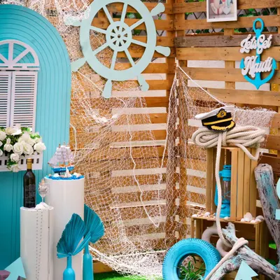 Get "nauti" with a fun nautical-themed party. I used a ship's wheel, fishing nets, anchors, and a cool blue color palette to create a maritime adventure perfect for a birthday or bachelorette.