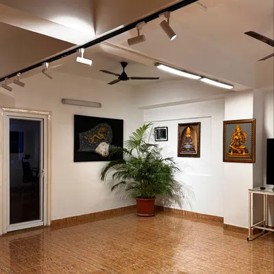 The studio is spacious and well-lit with professional track lighting, creating the perfect environment to work on your art. This is the main area where we hold our painting and drawing workshops.