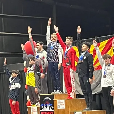 What a weekend! Our Optional Men's team had HUGE success at Western Nationals, with two athletes becoming National Champions. Here they are on the podium.