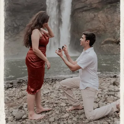 The classic proposal moment, captured with a vintage feel. The power of the waterfall behind them makes this intimate question feel even more significant.