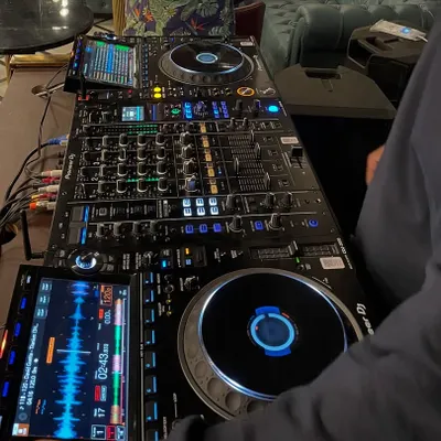 A close-up of my workspace. I only use professional Pioneer DJ gear to ensure the best sound quality for every performance.