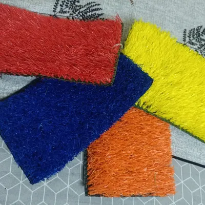 A collection of my solid color turf samples. I stock bright options like red, blue, yellow, and orange for projects that require a bold visual impact.