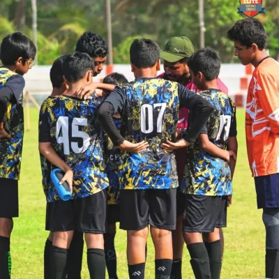 United as one. A team huddle before the match begins, where strategy is discussed and spirits are high. This is where we come together to fight for a common goal.