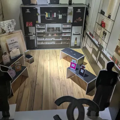 A closer look inside the 3ft x 3ft model of a luxury showroom. This view highlights the detailed interior, including product displays, lighting considerations, and branding elements, all crucial for an interior design portfolio.