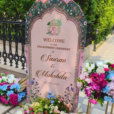 A personalized welcome sign for an engagement ceremony. The design features a beautiful floral border and a custom monogram, giving guests a warm and personal greeting.