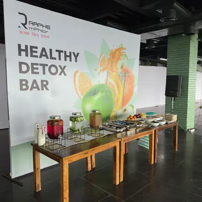 A view of the Healthy Detox Bar set up for a corporate yoga event. Offering healthy food and drink options is a great way to enhance the wellness experience and show a company's commitment to employee health.