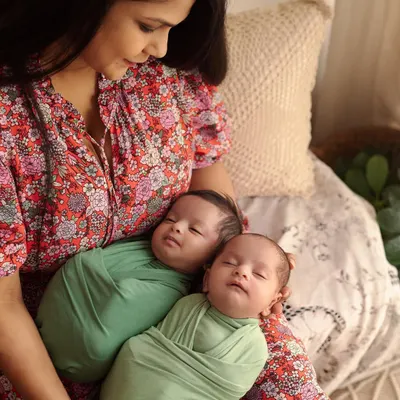 A mother holding her newborn twins for the first time is a memory to cherish. In my studio, we create a calm and gentle environment to capture these quiet, loving moments. The focus is all on you and your new babies.