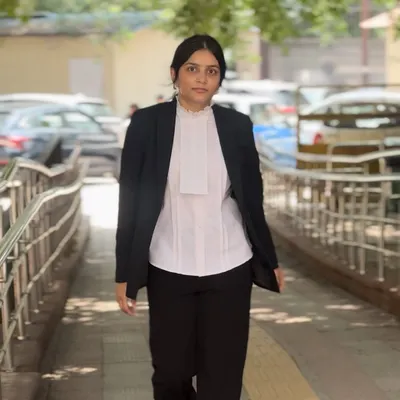 Dressed in my court attire, I am ready to present evidence and argue on your behalf. I specialize in litigation for a range of cyber crimes, including online harassment and financial scams.