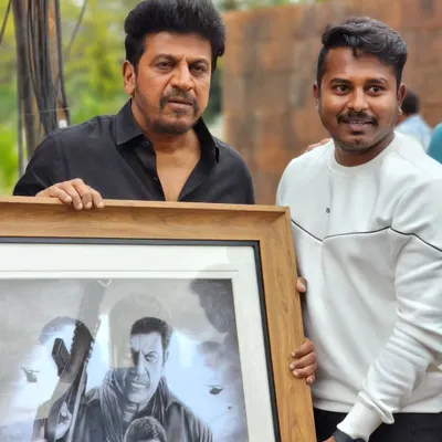 A moment I'll never forget: presenting my 'Ghost' movie poster sketch to the legendary actor Shivarajkumar himself. His appreciation for the art was incredibly rewarding.