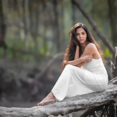 A dreamy, editorial-style portrait taken in a forest setting. This kind of shoot is perfect for anyone wanting to create something artistic and out of the ordinary.