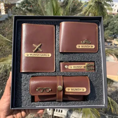 A perfect combo for him, this set includes a personalized wallet, passport cover, keychain, and eyewear case. I can engrave a name and add a charm to each item, and it comes packed in a premium gift box.