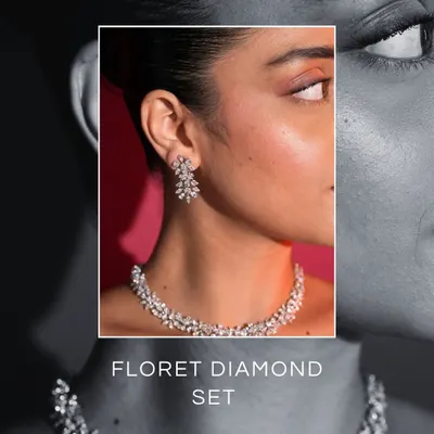 For the bride who believes in understated luxury, the Floret Diamond Set is a trousseau essential. This black and white image highlights its floral-inspired design.