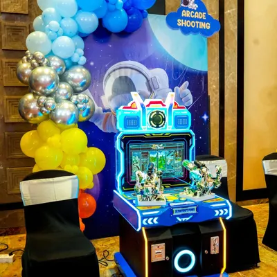 An "Arcade Shooting" game set against a space-themed backdrop, bringing the excitement of the arcade to the party.