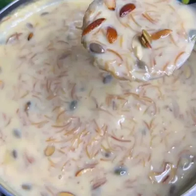 A spoonful of my creamy Simaiya Kheer. You can see the rich texture and the generous amount of nuts that I add to every serving.