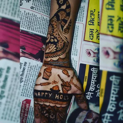Celebrate Holi with a unique themed design. This piece features playful motifs of pichkaris, buckets of color, and gujiyas, along with the words "Happy Holi" to truly capture the festival's joyful spirit.