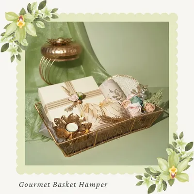 Our Gourmet Basket Hamper for Diwali. This beautifully arranged basket includes boxes of mithai, chocolates, and a decorative diya, all presented in an elegant gold wire basket.