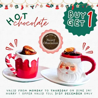 Christmas magic in every cup. This graphic announces our Buy One Get One Free offer on hot chocolates, available Monday to Thursday for dine-in guests during the festive season.