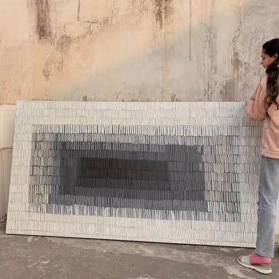 Here I am with a massive 8ft x 4ft textured canvas created for a home in Gujarat. The piece features thousands of individual textured strokes that create a gradient effect, drawing you into its depths.
