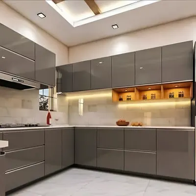 A sleek, L-shaped kitchen featuring high-gloss grey acrylic cabinets for a reflective, modern finish. We used profile lighting under the upper cabinets and built-in spotlights in the open wooden niches to add warmth and highlight decorative items. The design prioritizes a minimalist look with integrated appliances and handleless drawers.