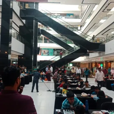 A wide view of our tournament setup at a bustling mall. We are equipped to manage events in large public spaces, attracting players and spectators alike.