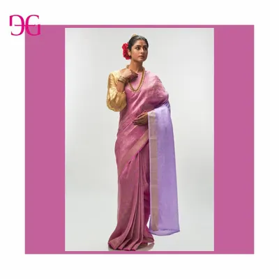 A beautiful silk linen saree from the Aadya collection in a soft mauve. The contrasting lavender pallu and golden puff-sleeve blouse create a look that is both traditional and fresh.