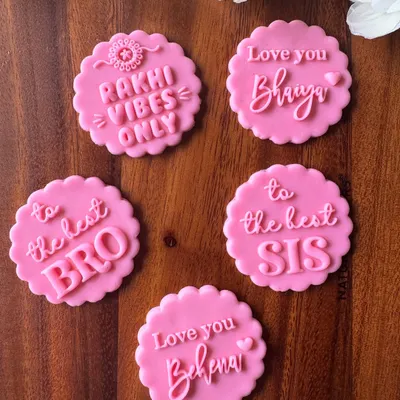 Our Fondant Stamps Collection for Raksha Bandhan, featuring designs like 'Rakhi Vibes Only', 'Love you Bhaiya', and 'to the best BRO' to personalize your festive sweets.