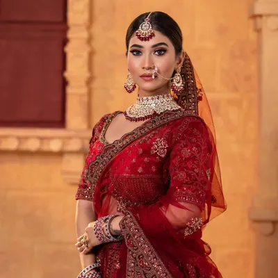 A stunning North Indian bridal look we created for a demonstration. The deep red velvet lehenga, kundan jewellery, and smokey eye makeup create a look of pure royalty.